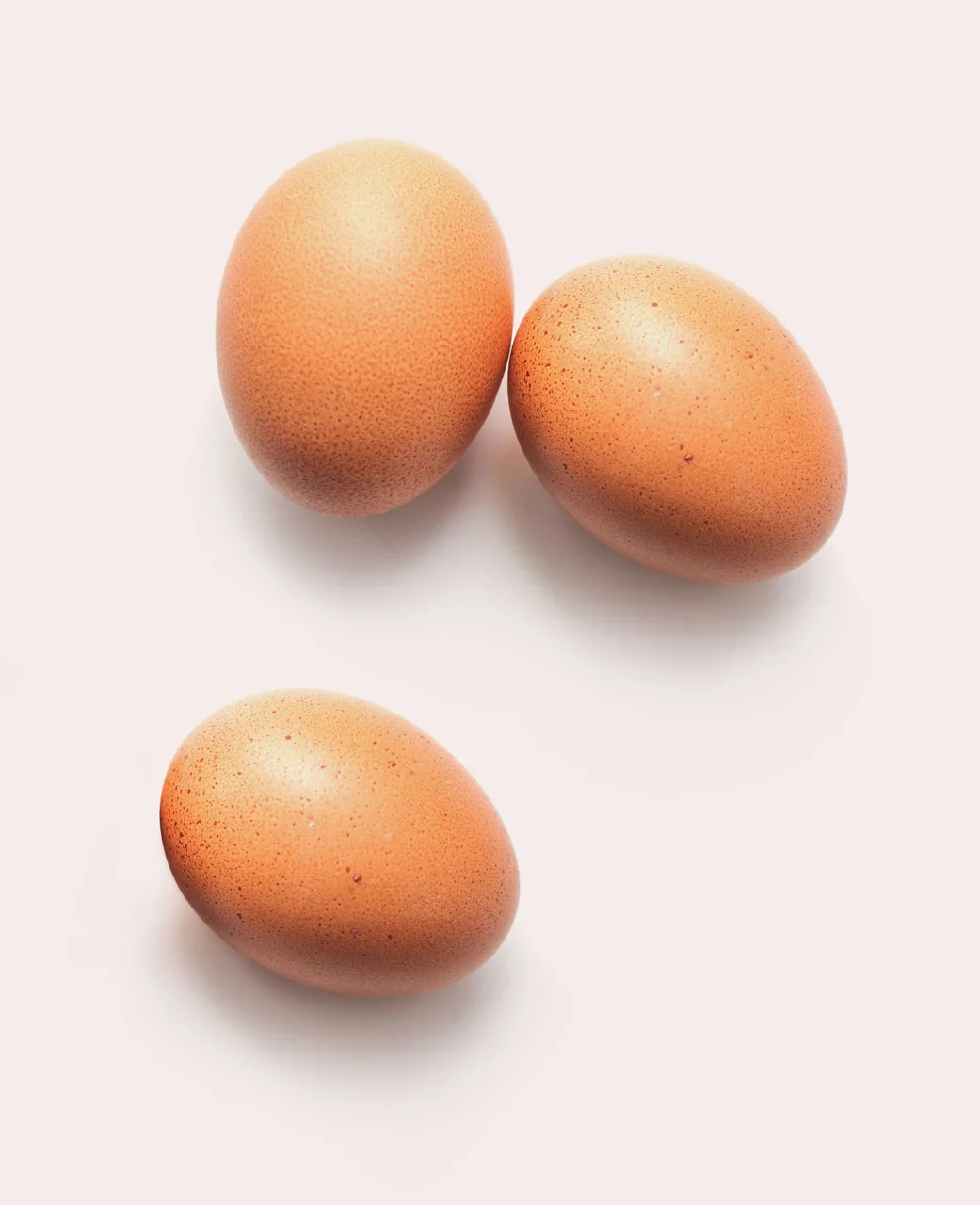 Three brown eggs